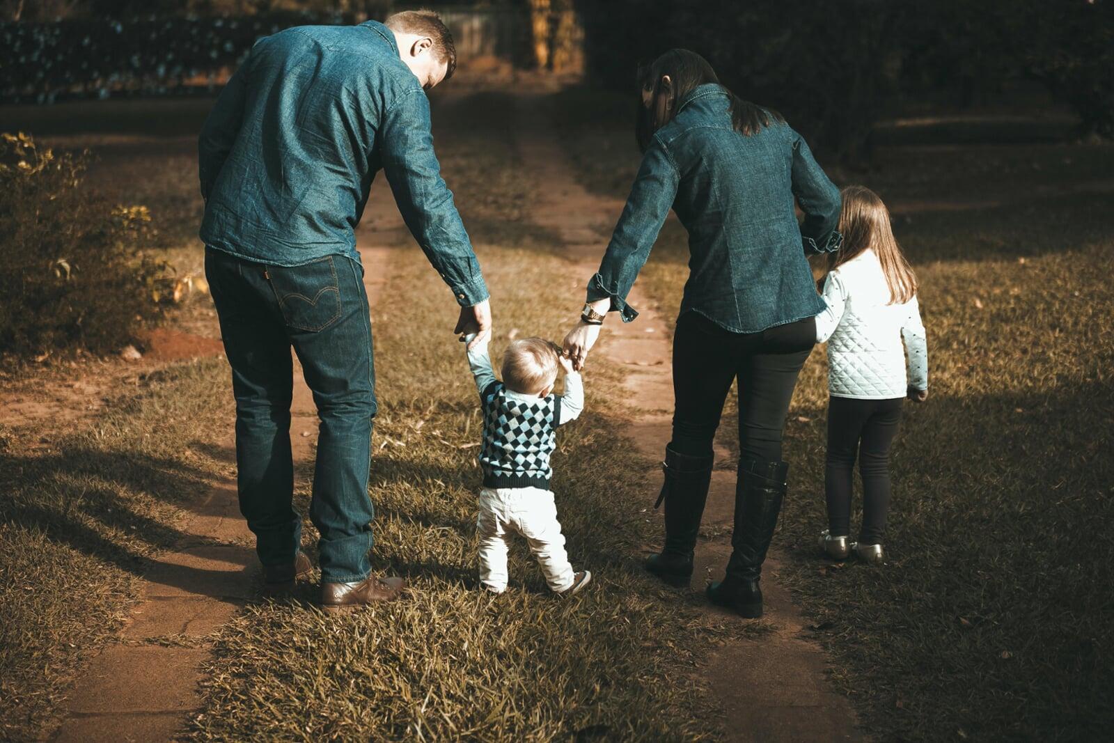 young couple with two young children